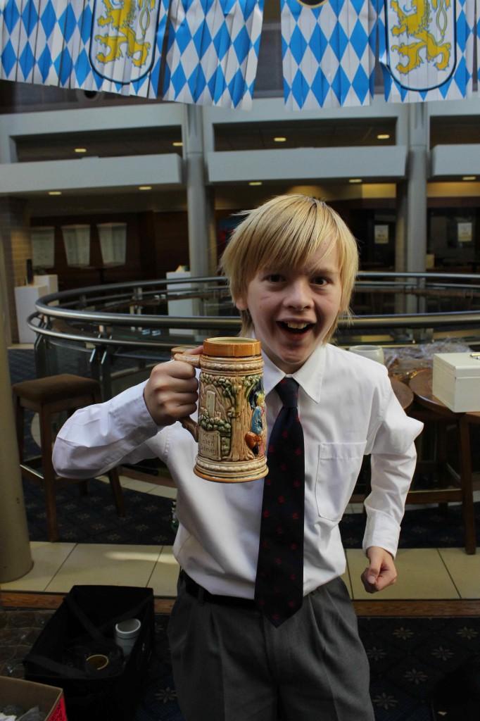 Cheers! grade 10 student, Dougald L, raises his mug as the festivities commence. 