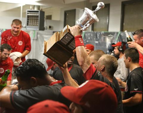 Vancouver Canadians celebrating after capturing their third straight title on a 5-0 win over the Boise Hawks.