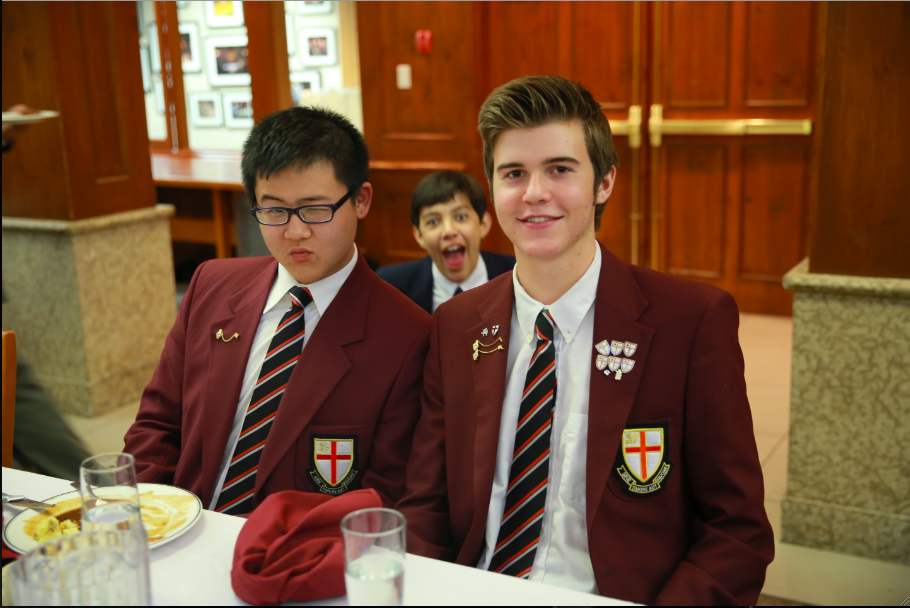 Jackson Au (12) and Alastair Pitts (12) pose for the camera oblivious to a Jorge Alamillo (10) photobomb.