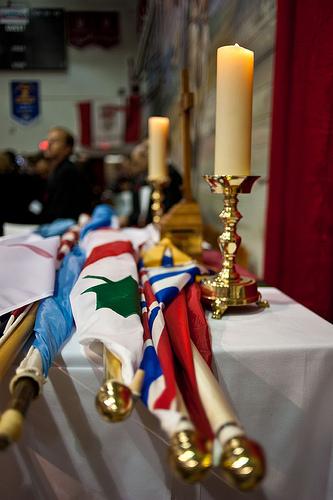 The flags and candles displayed on a table prior to Mondays Remembrance Day service