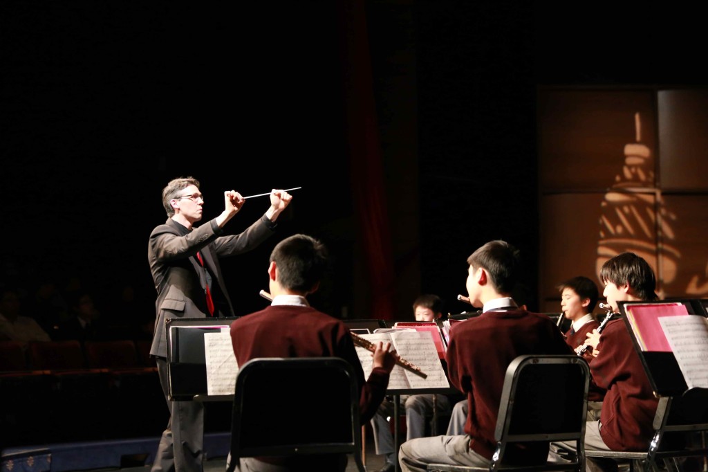 Dr. Markel conducting the Grade 9 Saints musicians.