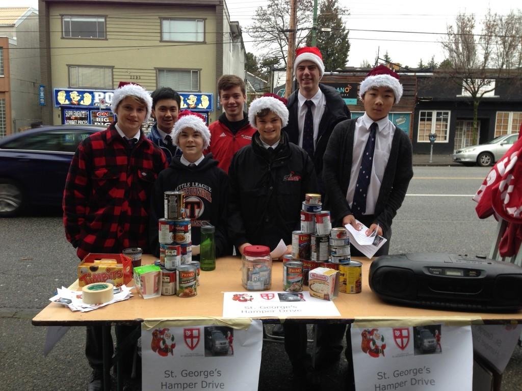Ms. Gin and Mr. Roberts advisees collect cans and donations on the weekend as part of their Hamper Drive contributions.