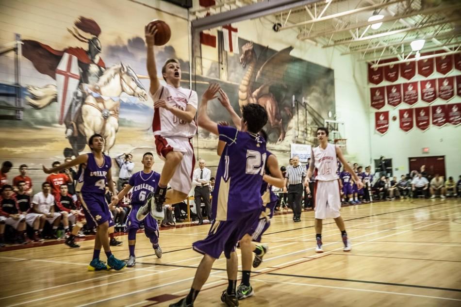 Ethan Scott (11) goes for the hoop in the one of many Saints-VC games.