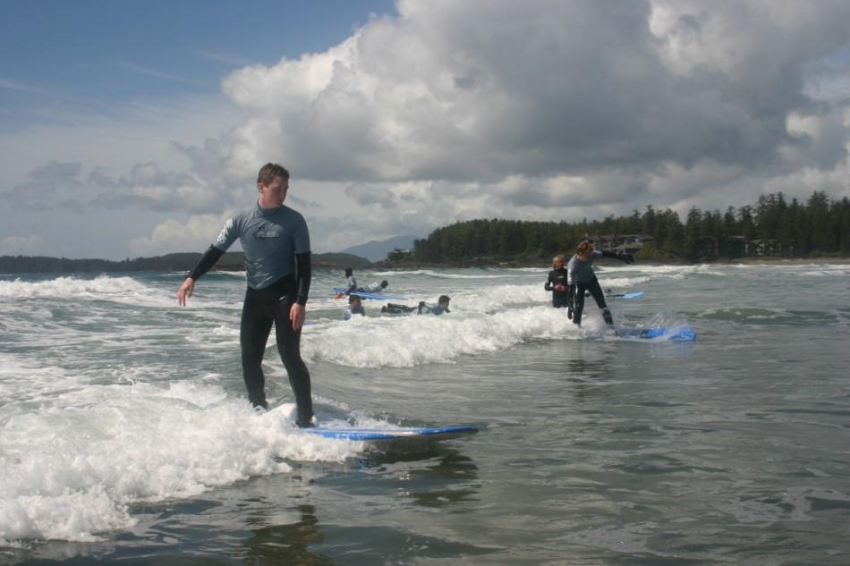 Hunter L. and Jack C. riding the waves in Tofino 