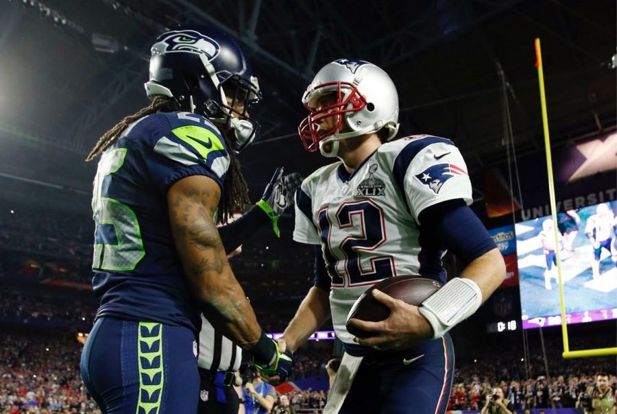 Richard Sherman and Tom Brady shake hands at the end of the game.