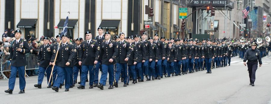 Soldiers Marching Down The Street During The St. Patricks Day Parade
