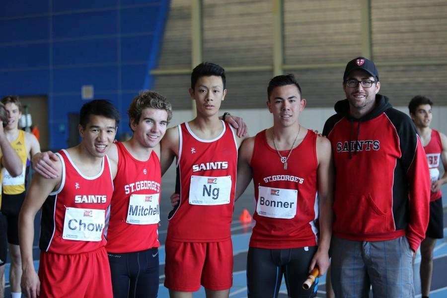 The St. Georges A Team takes a photo together after running the 4x200 relay (Left to right: Kennedy Chow, Colin Mitchell (Grade 12), Kenneth Ng, Chris Bonner (Grade 11), Mr. Aidan Docherty (Head Coach)