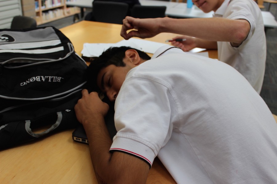 Zaiq Rana (Grade 11) snoozing in the library