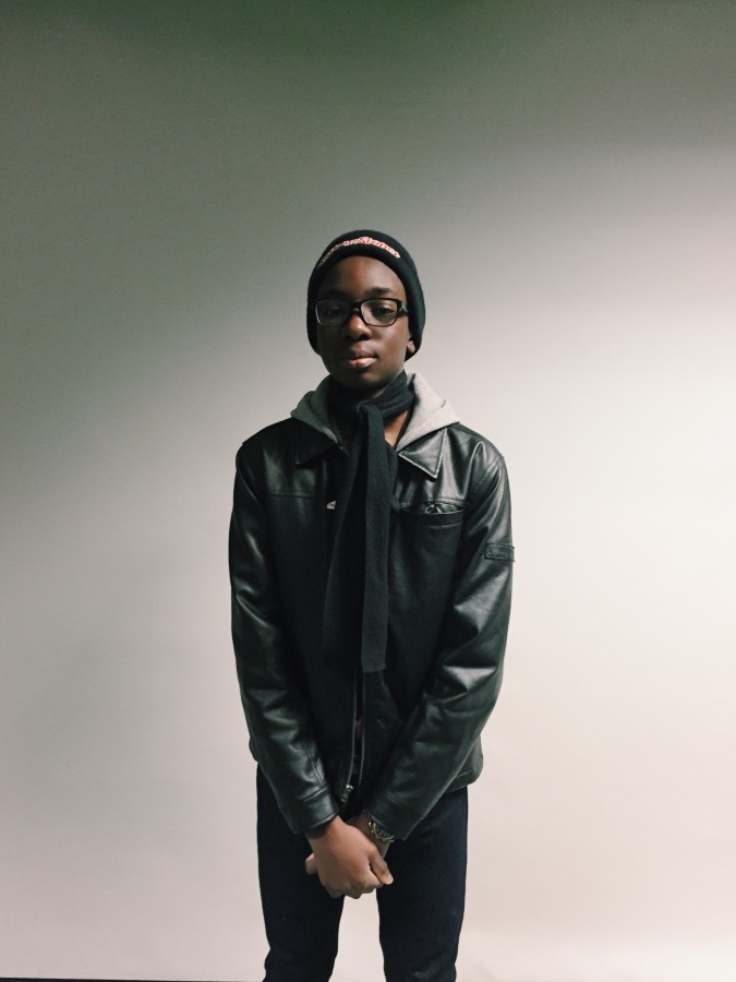 Michael Oduoza (11) flashes his fancy attire. 