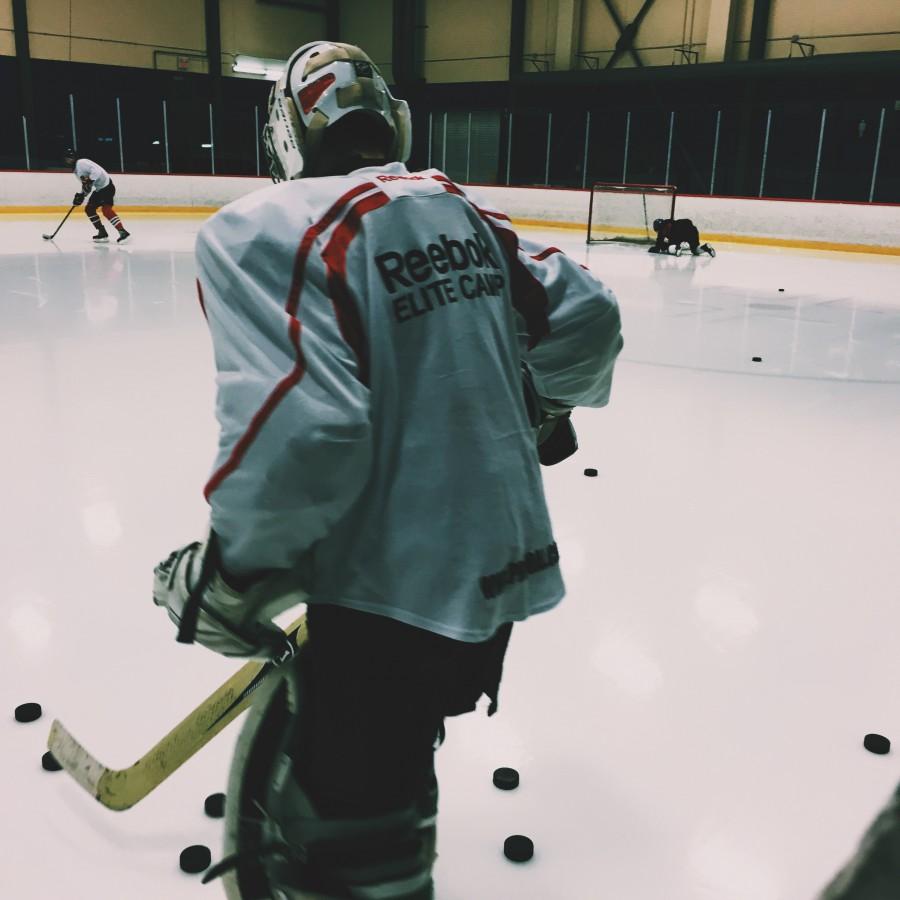 Returning+goaltender+Liam+Ross+%2812%29+steps+onto+the+ice+for+tryouts+to+cap+off+a+Tuesday.+