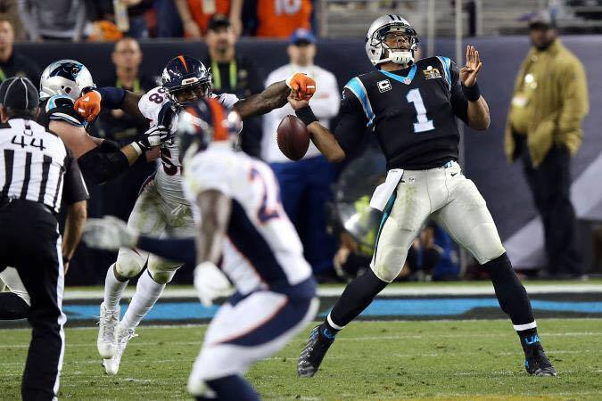 Von Miller knocks the ball out of Cam Newton's hand in the fourth quarter.