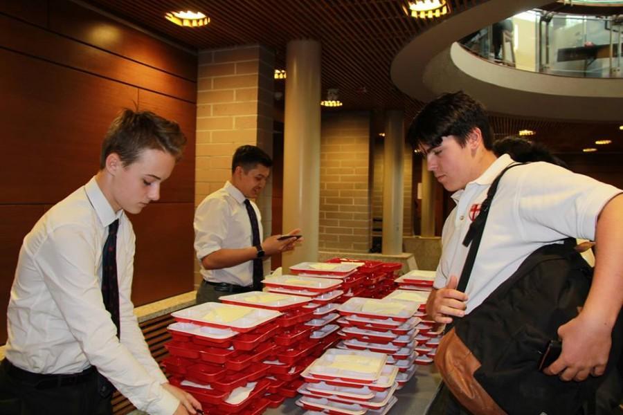 Student volunteers setting up for the buffet. 