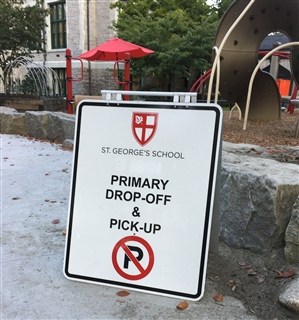 A cautionary sign displayed in front of the Junior School
