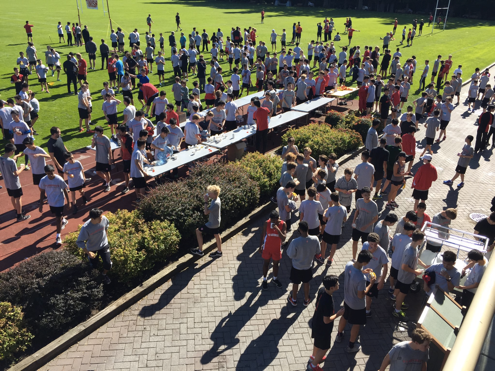 Students gather on Nigel Toy Field