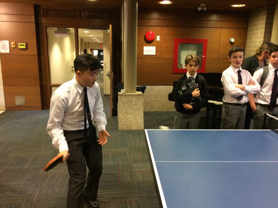 Some students playing ping pong in the Great Hall.