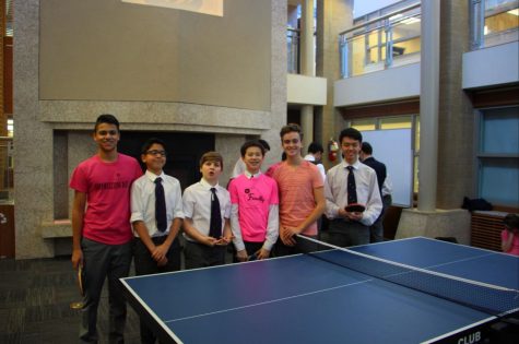 Students in pink stopped playing table tennis to pose for The Creed. (Tommy Kuo)