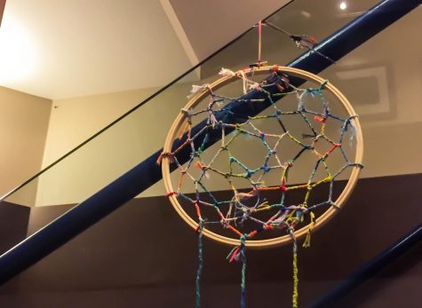 A Dream catcher made out of friendship bracelets that the Grade 11 boarders made during the 2017 Anvil Island trip. It is currently hanging in the main stairwell in Harker Hall    
