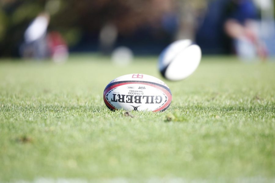 A rugby ball on the loose during warm-up.