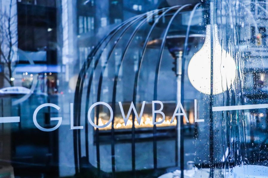 The Glowbal logo with the restaurant in the background