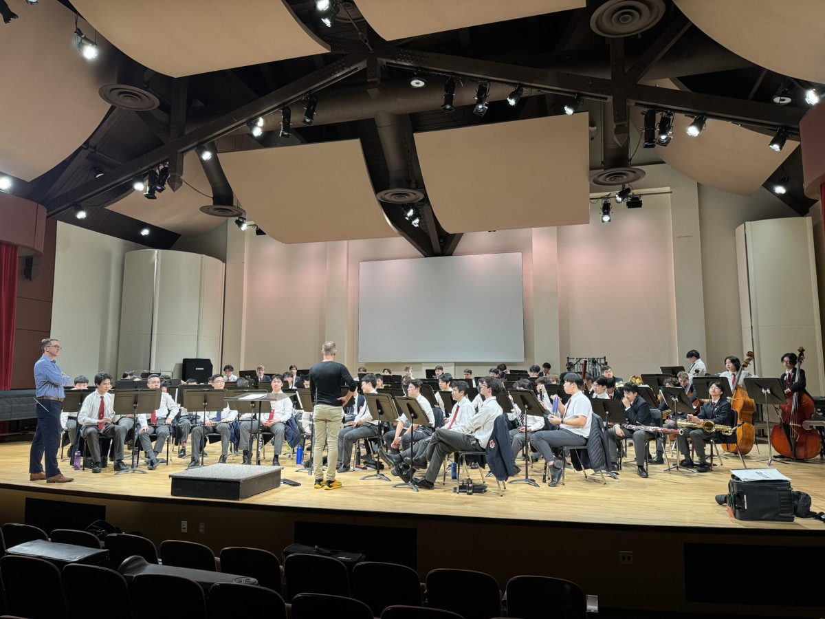 The Senior band participating in a workshop held by Dr. Morris at the University of Puget Sound