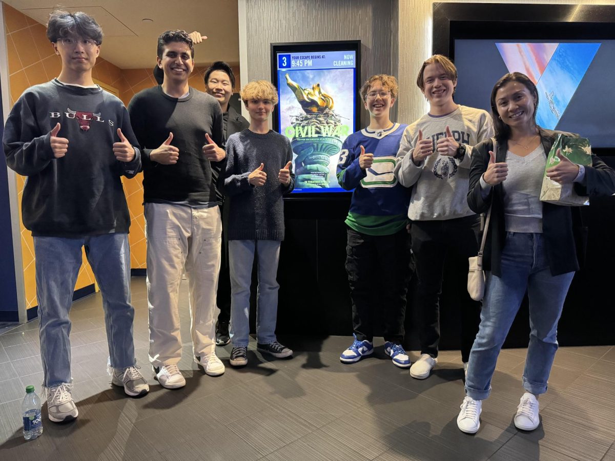 The Echo poses with the movie poster after watching the film with a unanimous two thumbs up