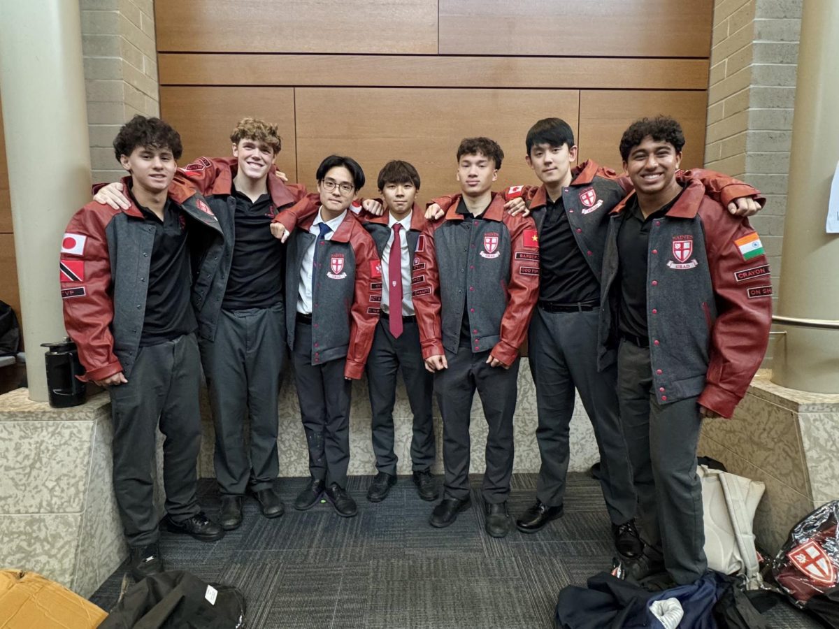 Ms. Gin's Advisor group receives their 2027 Grad Jackets